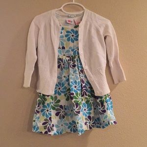 Blue dress paired with white cardigan